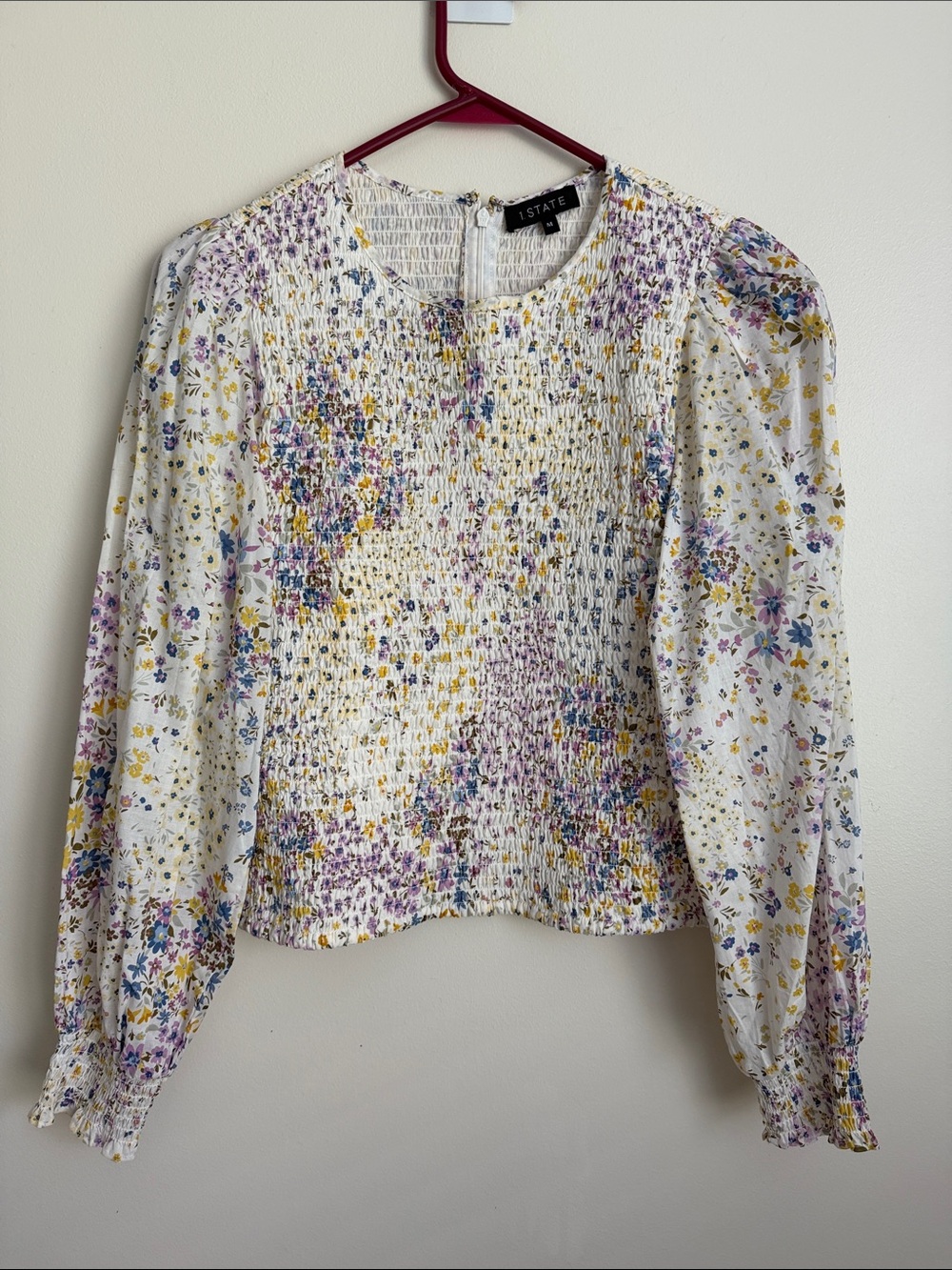 1. State White Floral Long Sleeved Smocked Peasant Blouse